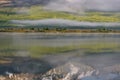 Mountains lake fog trees forest reflection Royalty Free Stock Photo