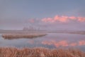 Mountains lake island fog dawn reflection autumn Royalty Free Stock Photo