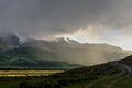 Mountains lake overcast sunlight fog Royalty Free Stock Photo