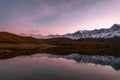 Mountains lake sunset reflection clouds autumn Royalty Free Stock Photo