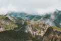 Mountains Landscape from Hermannsdalstinden summit in Norway foggy scandinavian