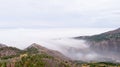 Mountains With A Lot Of Fog Royalty Free Stock Photo