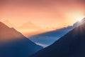 Mountains and low clouds at sunrise in Nepal Royalty Free Stock Photo