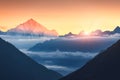 Mountains and low clouds at sunrise in Nepal Royalty Free Stock Photo