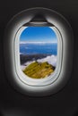 Mountains on Madeira Portugal in airplane window
