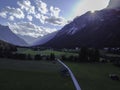 Mountains and meadows in a beautiful landscape in Austria at the Brenner Pass at sunset Royalty Free Stock Photo