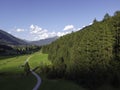Mountains and meadows in a beautiful landscape in Austria at the Brenner Pass at sunset Royalty Free Stock Photo