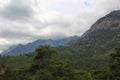 Mountains near which thickened gloomy clouds