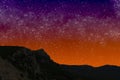 Mountains at night on the background of starry sunset sky Royalty Free Stock Photo