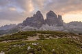 Mountains Panorama of the Dolomites at Sunrise with clouds. Photograph is showing Tre Cime di Lavaredo in the Dolomites, Italy. Royalty Free Stock Photo