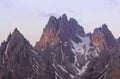 Mountains Panorama of the Dolomites at Sunrise with clouds. Photograph is showing Tre Cime di Lavaredo in the Dolomites, Italy. Royalty Free Stock Photo