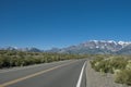 Mountains range with snow peaks and road Royalty Free Stock Photo