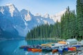 Mountains, reflections and Canoes on Moraine Lake, Banff, Alberta Royalty Free Stock Photo