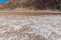 Mountains rise above the salt flats at Badwater Basin, Death Valley National Park, California, USA Royalty Free Stock Photo