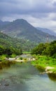 The mountains and river at Kiriwong village on a cloudy day. The beautiful landscape of Kiriwong village located at Laan Saka