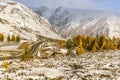 Mountains road snow autumn trees Royalty Free Stock Photo