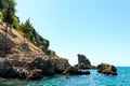 The mountains and sea scenery with blue sky, beautiful nature. Summer time. Vocation concept. Selective focus. Royalty Free Stock Photo