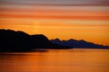 Mountains and sea - sunset & alpineglow Royalty Free Stock Photo