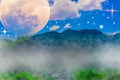 Mountains, sky and clouds, moon and stars. Royalty Free Stock Photo