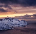 Mountains and sky during sunset. Senja island, Norway. Clouds on the sky during sundown.