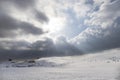 Mountains with snow in Campocatino Italy in winter. Thick clouds.