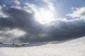 Mountains with snow in Campocatino Italy in winter. Thick clouds.