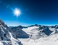 Mountains, sun with flare Royalty Free Stock Photo