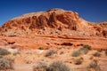 Mountains surrounding Fire wave during wonderful sunny day with blue sky, in Valley of Fire State Park, Nevada Royalty Free Stock Photo