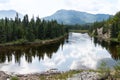 Mountains towering above the Rancheria River in Yukon, Canada Royalty Free Stock Photo