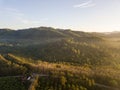 Mountains and trees with beautiful clouds and sky in sunrise