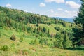 Mountains valley and lonely house on it Royalty Free Stock Photo