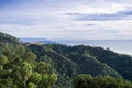 Mountains and valleys covered in coastal live oak trees and other evergreen shrubs, San Simeon, California