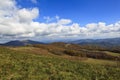 Mountains and White Puffy Clouds Royalty Free Stock Photo