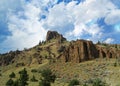 Scenic mountainside with rock formations seen along the North Fork Highway in Wyoming Royalty Free Stock Photo