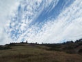 Mountaintops and cloudy sky