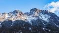 Mountan peaks in the snow on beautiful sunny day. Bright blue sky with large fluffy clouds. Poland, Zakopane