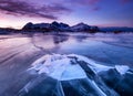 Mountans and frozen ice on at the sunset time. Sea bay and mountains at the sunset timetime. Royalty Free Stock Photo