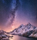 Mountans and reflection on the water surface at the night time. Sea bay and mountains at the night time. Milky way above mountains Royalty Free Stock Photo