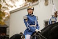 Mounted female member of the Romanian Jandarmi horse riders from the Romanian Gendarmerie in ceremonial and parade uniform