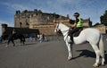 Mounted police at the Edinburgh Castle a historic fortress which dominates the skyline of Edinburgh, the capital city of Scotland Royalty Free Stock Photo