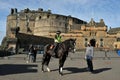 Mounted police at the Edinburgh Castle a historic fortress which dominates the skyline of Edinburgh, the capital city of Scotland