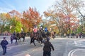 Mounted Police holding flags in NYC during Thanksgiving Parade