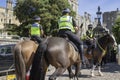 Mounted Police Officers on crowd control duty on the streets outside Royal Windsor Castle an official Royal Residence in Berkshire