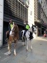 Mounted police officers near London Bridge on duty protecting citizens