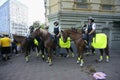Mounted police squad keeping order on the street during mass event