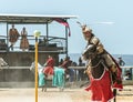 A mounted warrior shows his ability to wield a saber at a knight festival in Goren park in Israel
