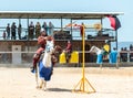 A mounted warrior shows his ability to wield a spear at a knight festival in Goren park in Israel