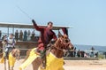 A mounted warrior shows his ability to wield a sword at a knight festival in Goren park in Israel