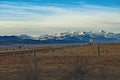 Mountians between blue sky and clouds