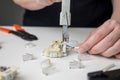Mounting the RJ45 module, attaching the wire to the computer socket in the room